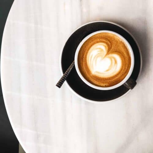 coffee-with-milk-with-hearty-latte-art-scaled